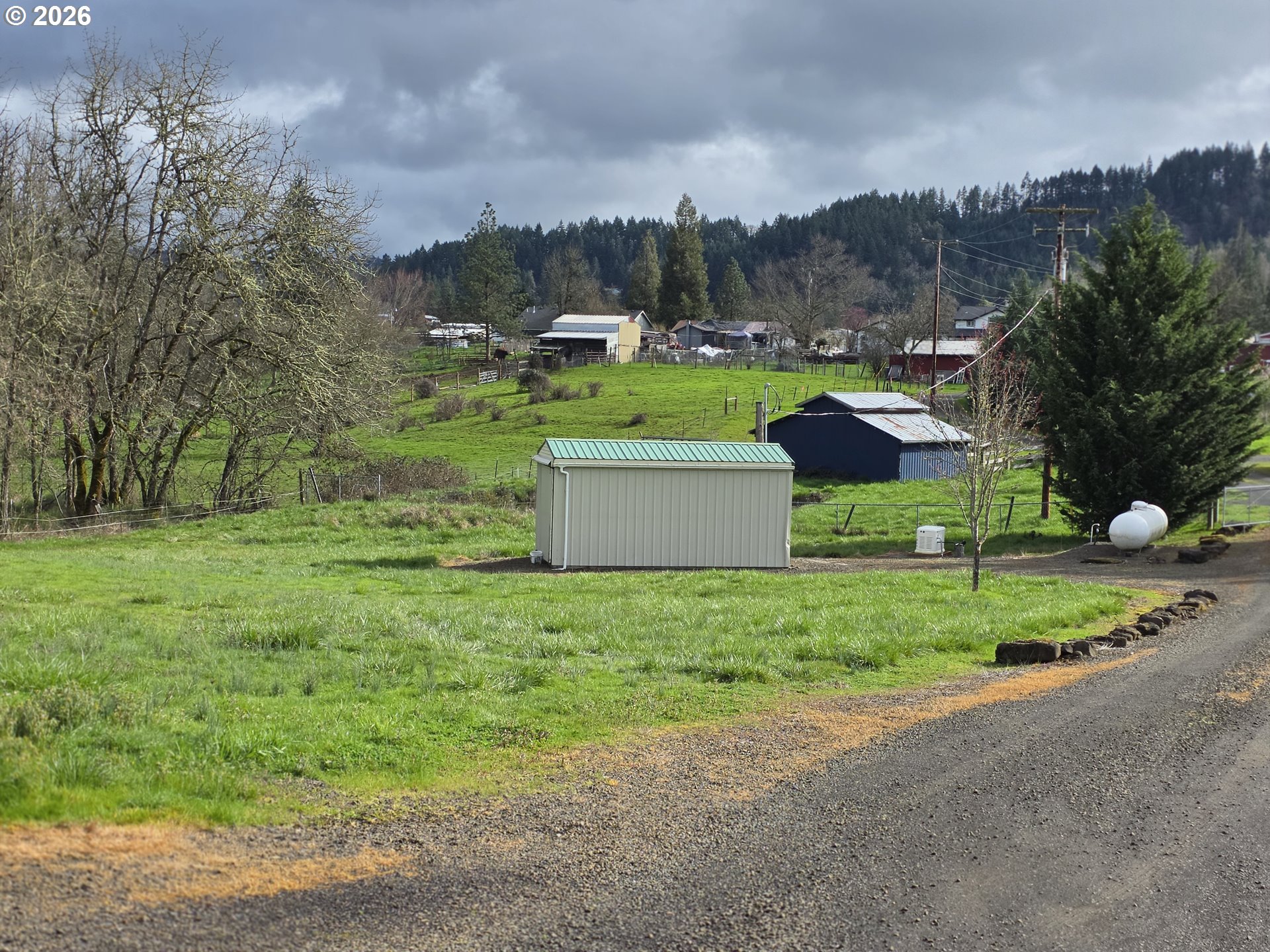 1909 Southwest Duke Road Sutherlin, OR 97479 - Photo 6 of 30 a view of a house with a yard
