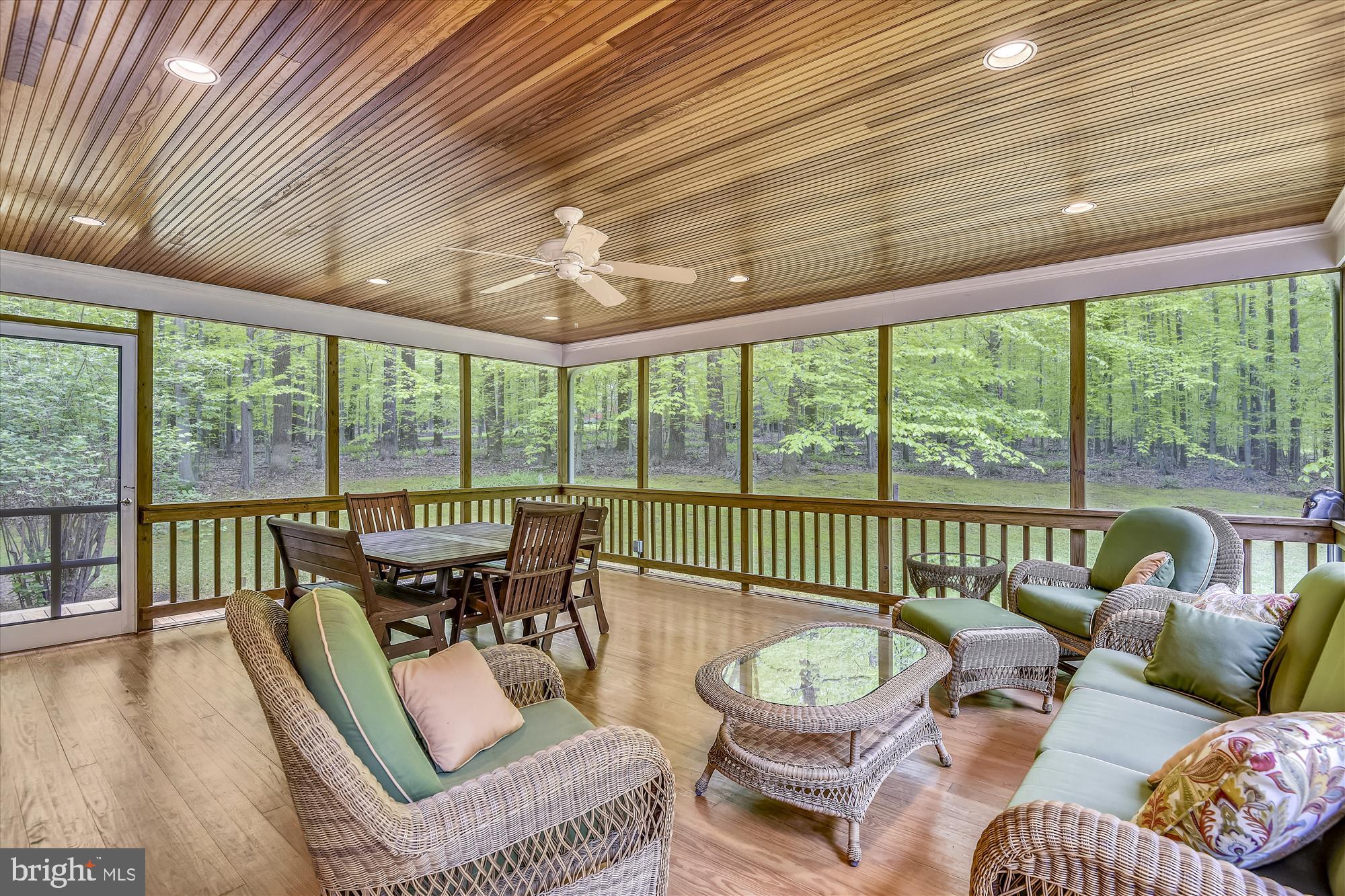 11615 Springtime Lane Fairfax Station, VA 22039 - Photo 14 of 38 a balcony with furniture and a large window
