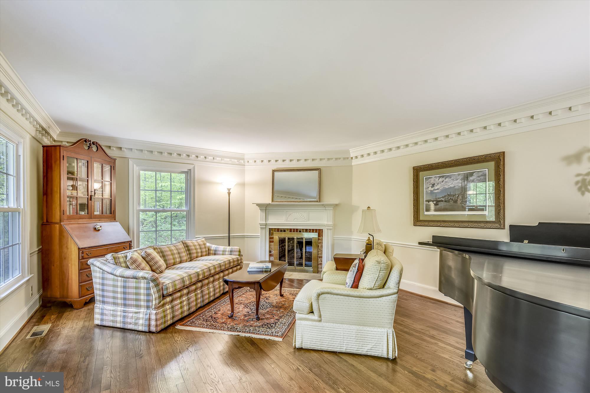 11615 Springtime Lane Fairfax Station, VA 22039 - Photo 15 of 38 a living room with furniture and a fireplace