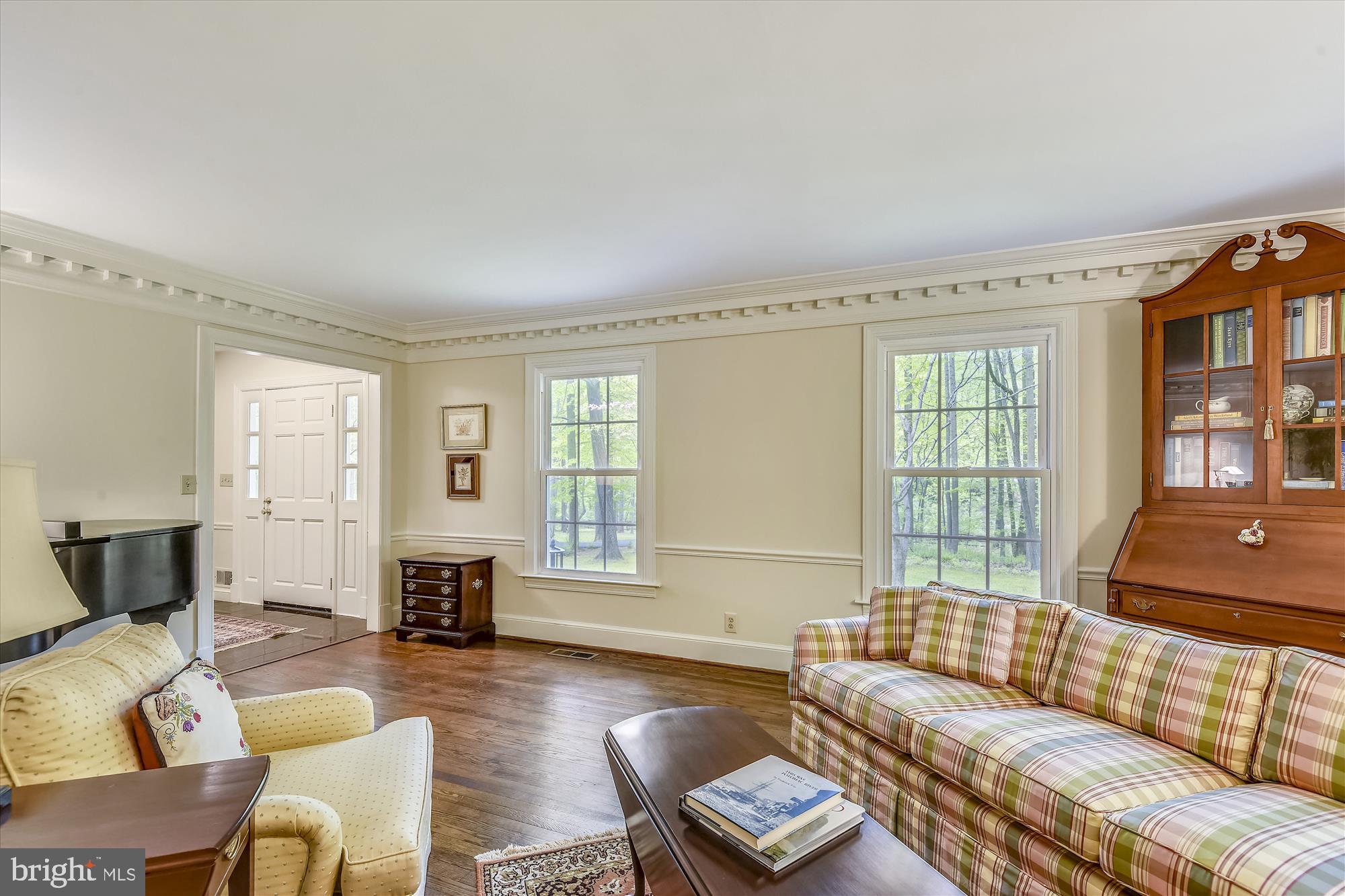 11615 Springtime Lane Fairfax Station, VA 22039 - Photo 16 of 38 a living room with furniture and a window