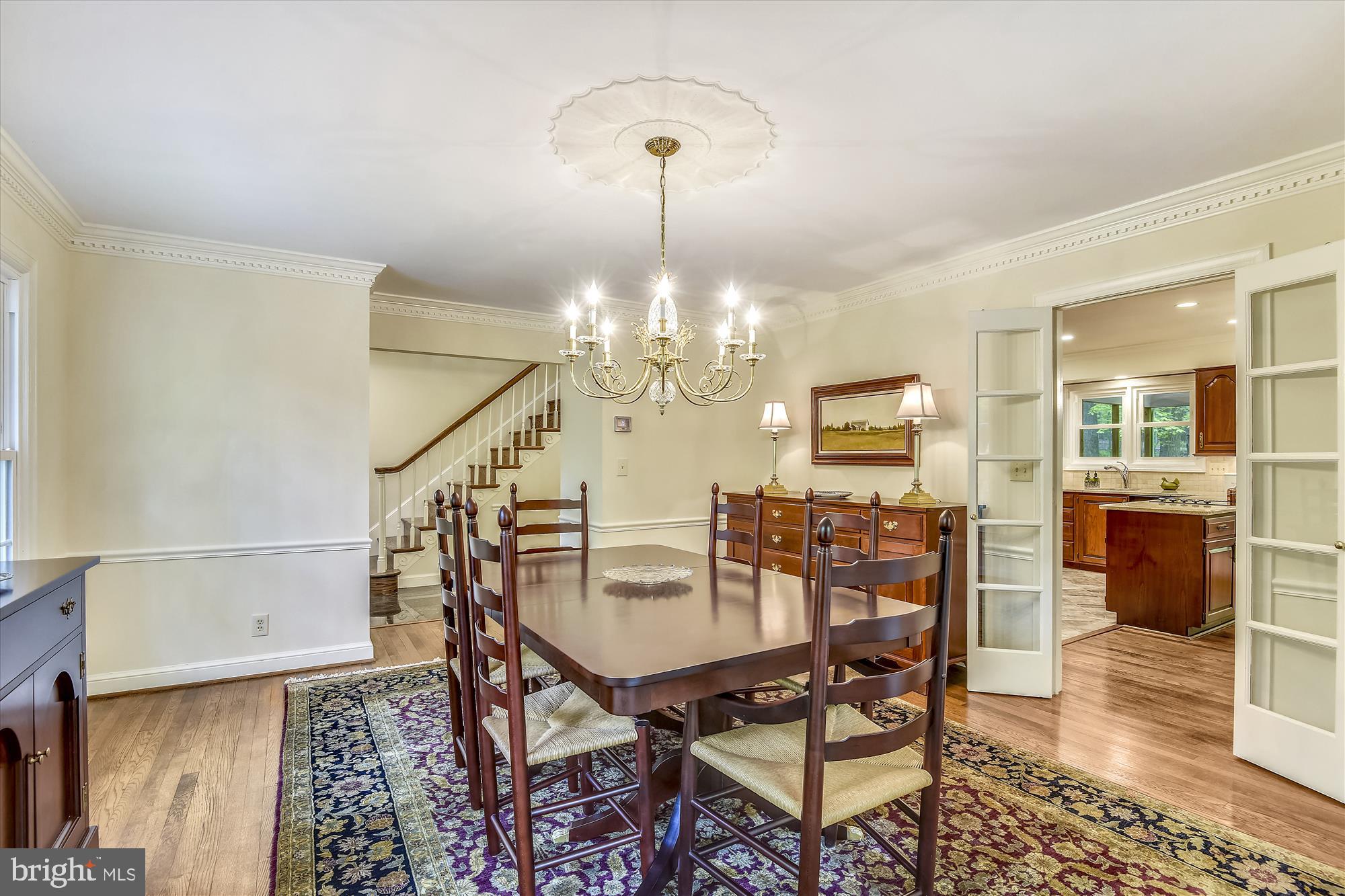 11615 Springtime Lane Fairfax Station, VA 22039 - Photo 18 of 38 a view of a dining room with furniture and wooden floor