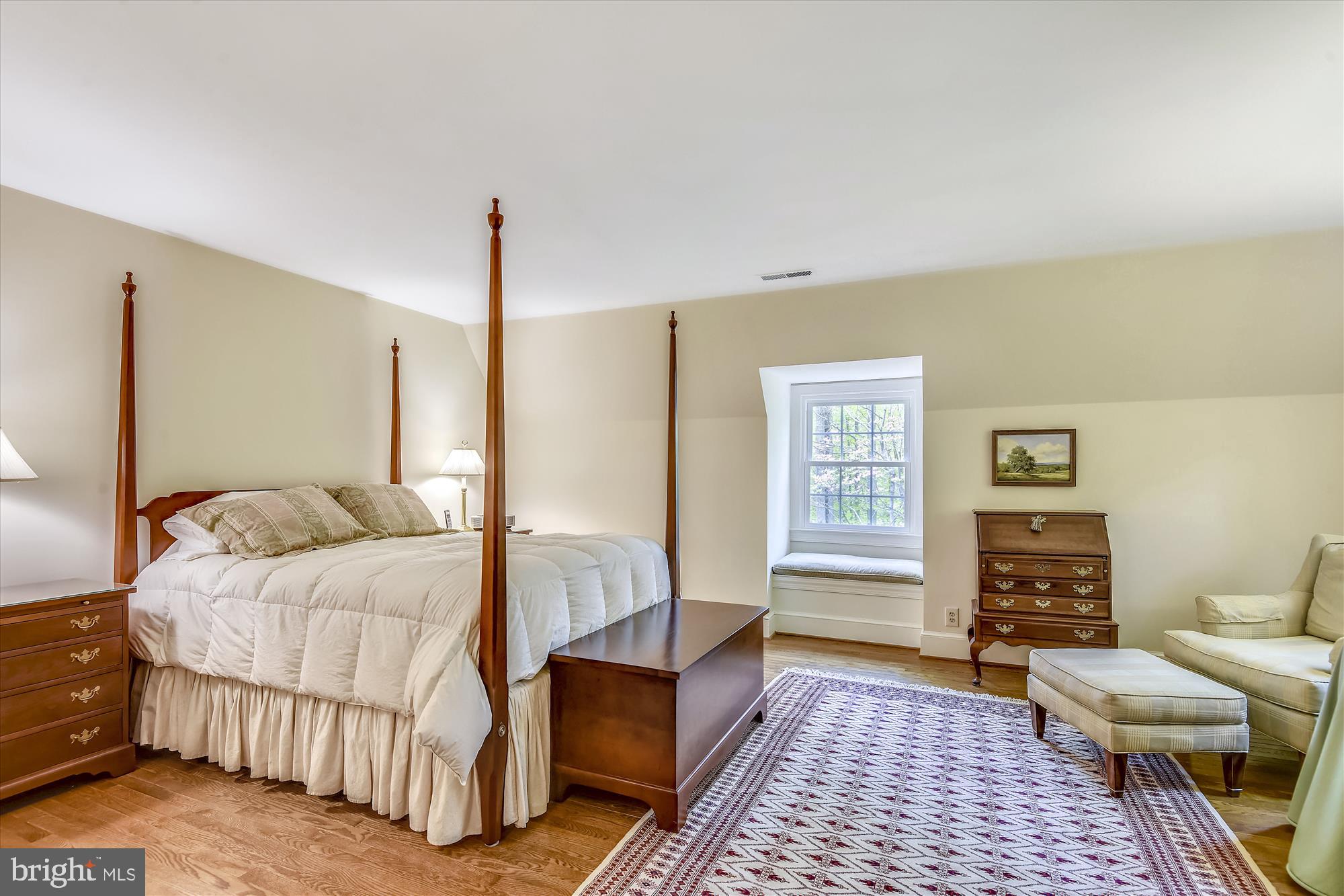11615 Springtime Lane Fairfax Station, VA 22039 - Photo 23 of 38 a bedroom with a bed couch and a window
