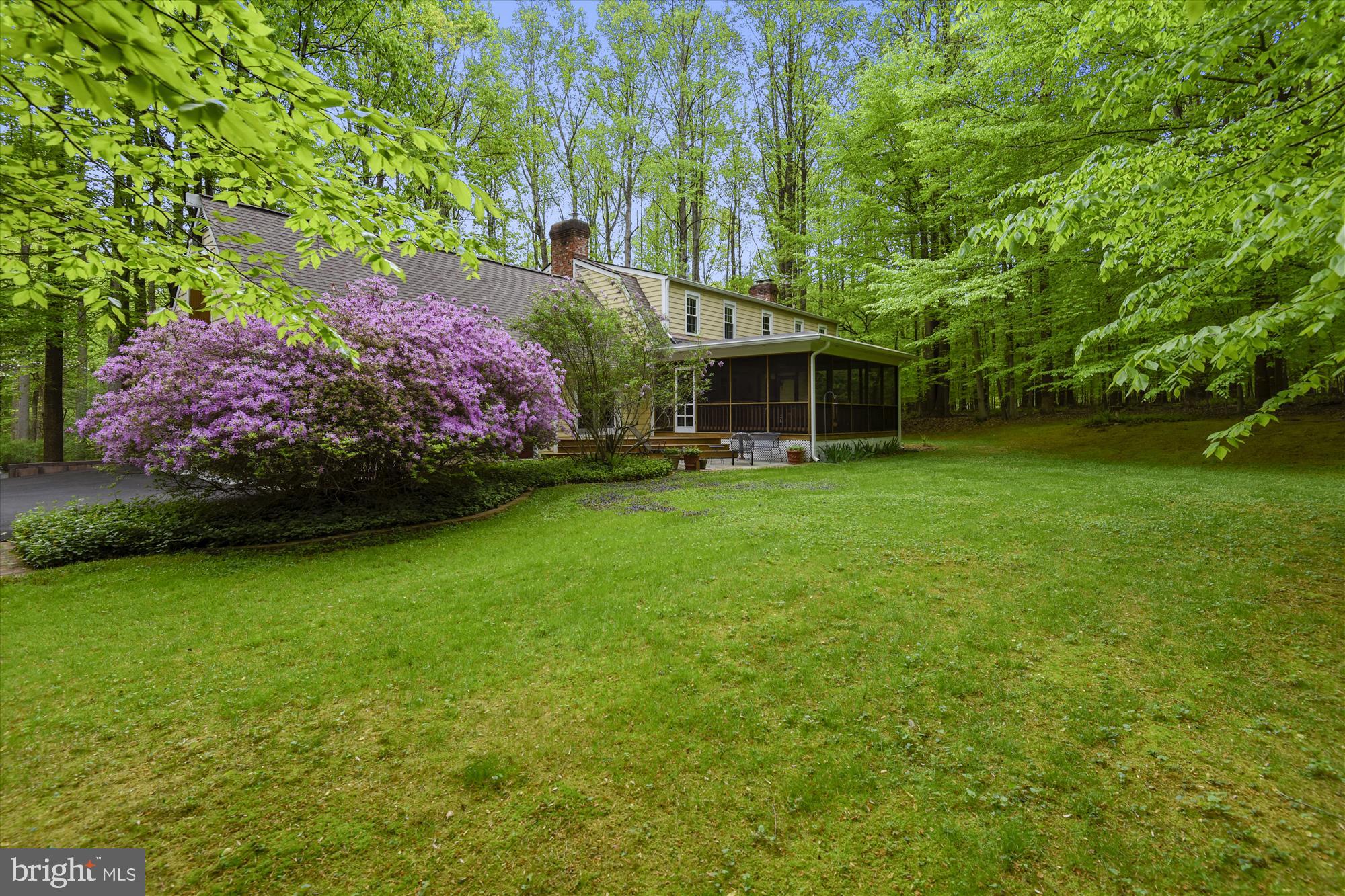 11615 Springtime Lane Fairfax Station, VA 22039 - Photo 37 of 38 a view of a house with a garden
