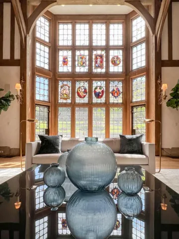 a view of a dining room with furniture window and outside view