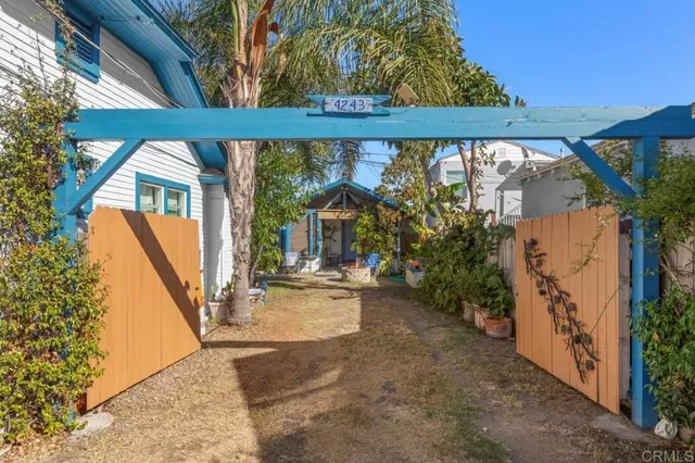 a view of a house with a street