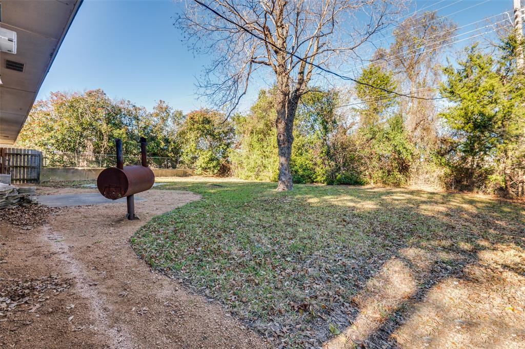 1308 Sundale Street Ennis, TX 75119 - Photo 12 of 12 a view of outdoor space with garden