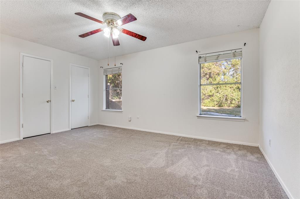 1308 Sundale Street Ennis, TX 75119 - Photo 9 of 12 a view of an empty room with a window