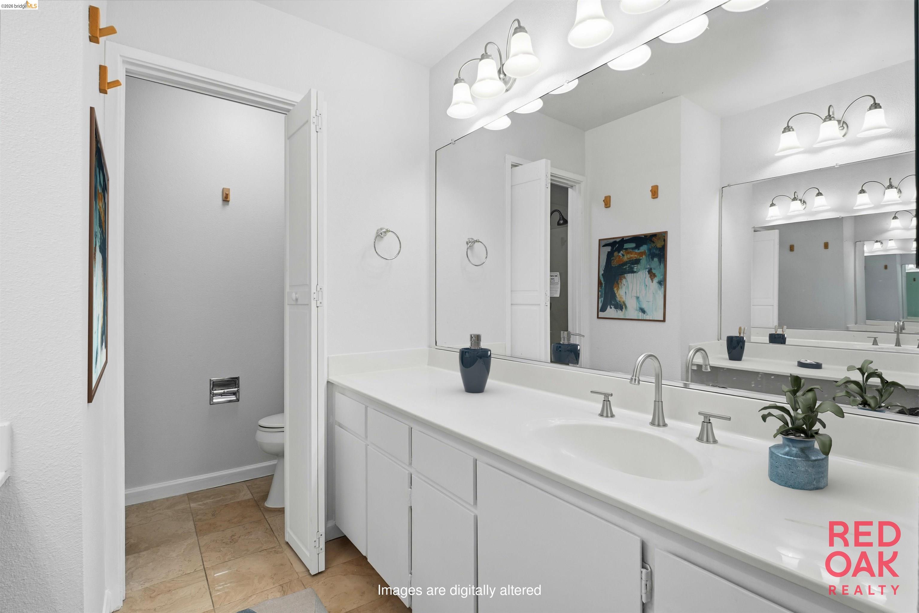 18018 Sahara Road Hayward, CA 94541 - Photo 10 of 20 a bathroom with a sink a mirror and a shower