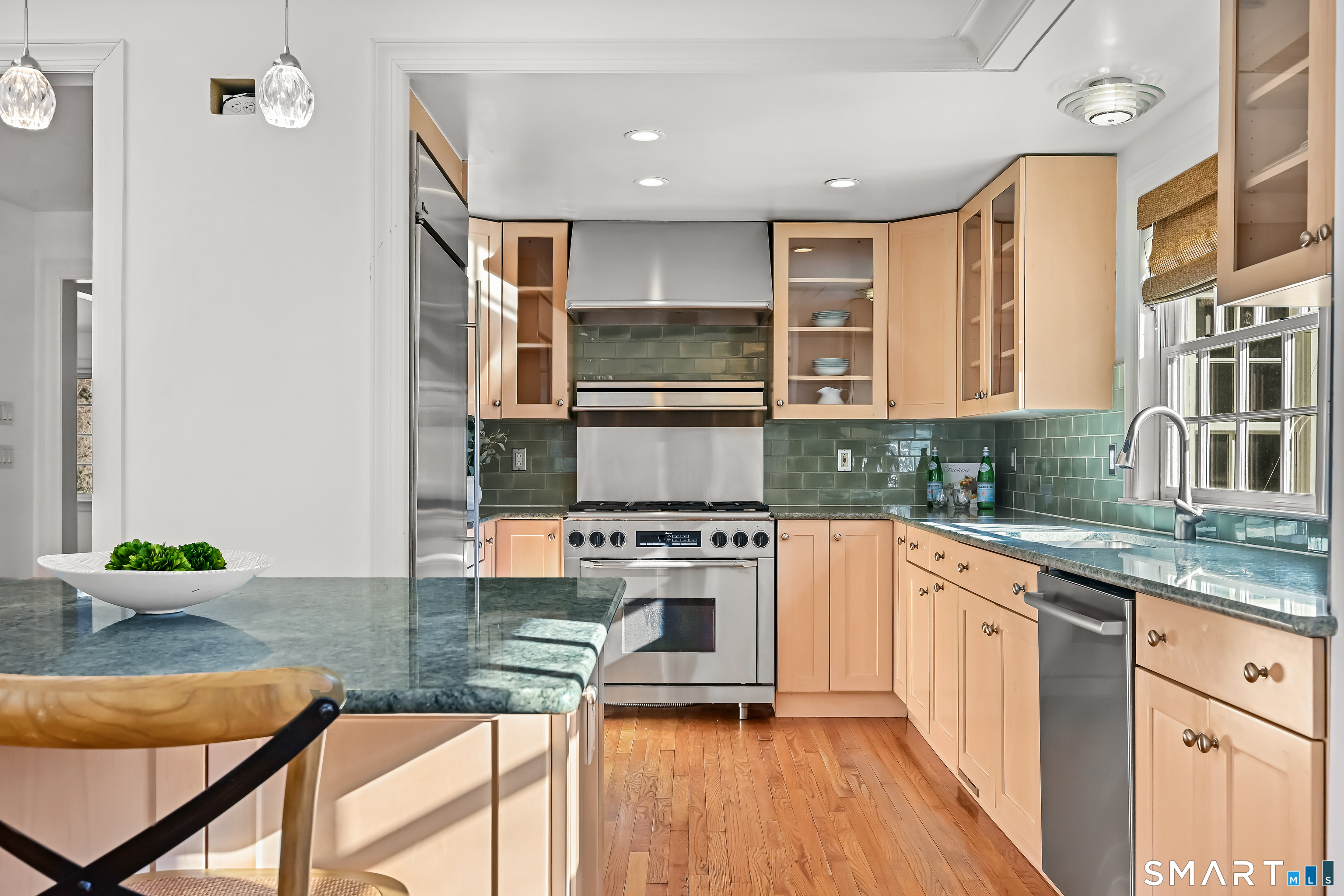 36 MacArthur Lane Stamford, CT 06902 - Photo 13 of 40 Kitchen with granite counters, 6 burner dual fuel range, and more...
