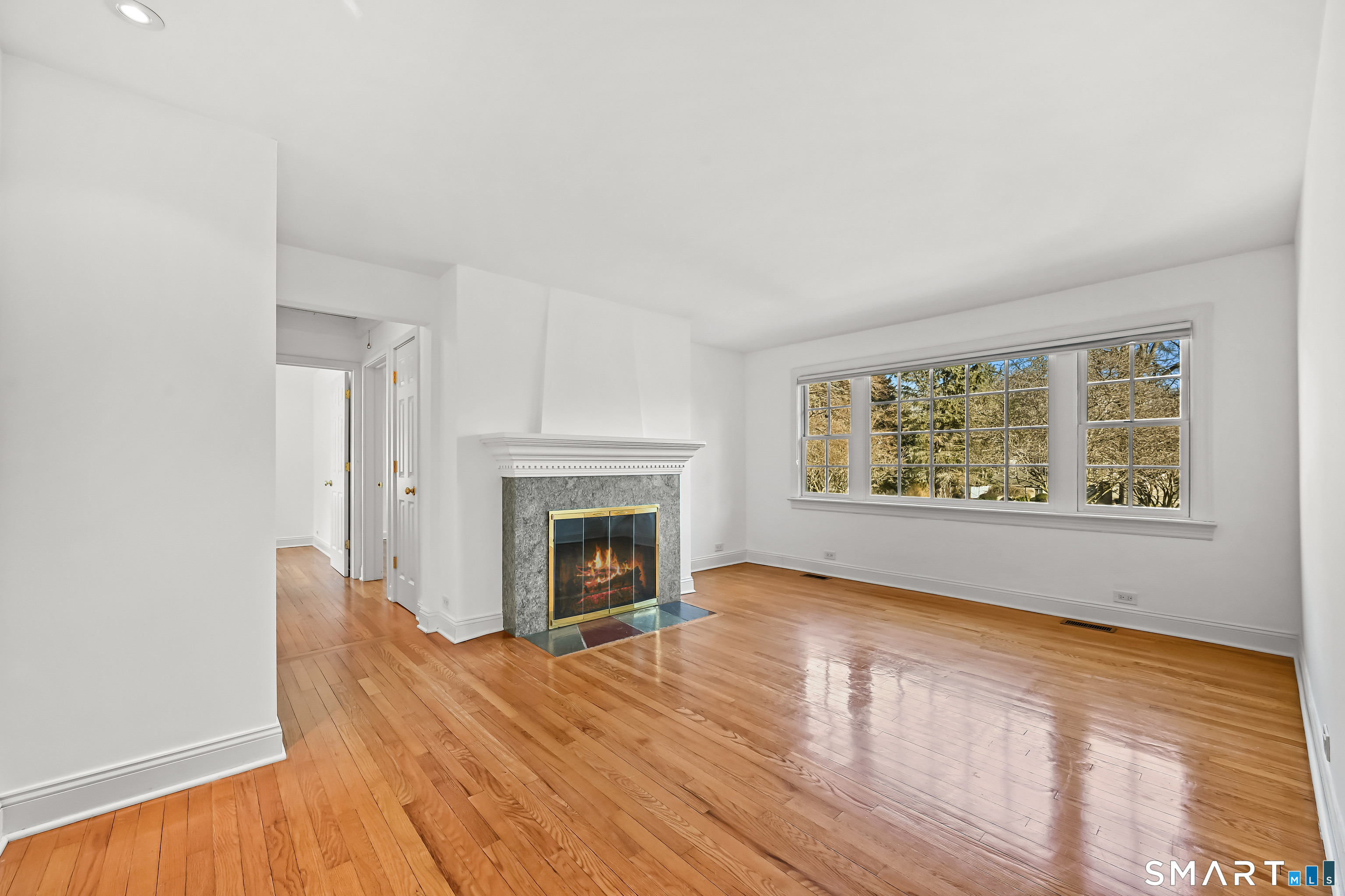 36 MacArthur Lane Stamford, CT 06902 - Photo 14 of 40 Main level Family Room with fireplace