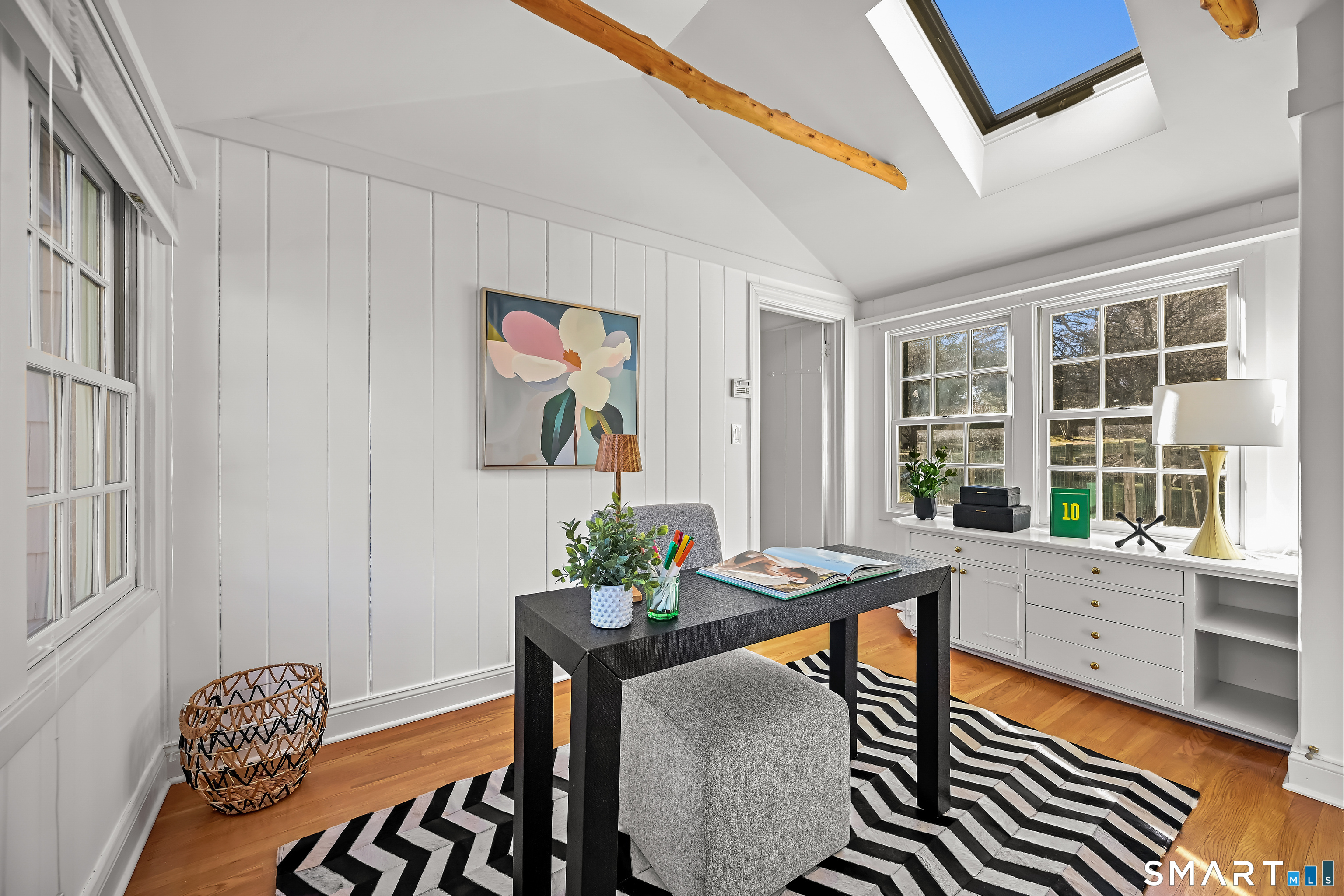 36 MacArthur Lane Stamford, CT 06902 - Photo 17 of 40 Main level office with vaulted ceiling, skylight and beams