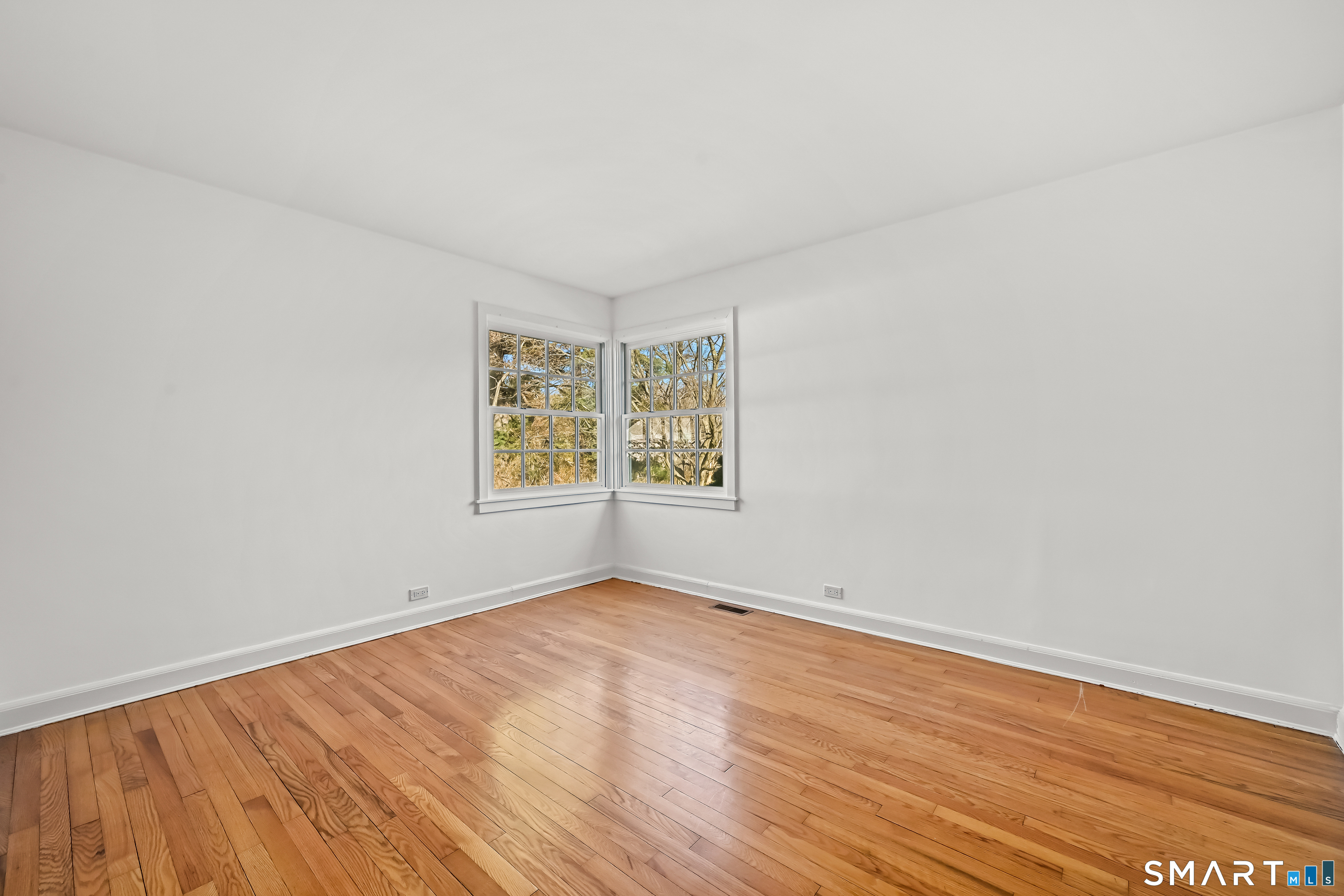 36 MacArthur Lane Stamford, CT 06902 - Photo 22 of 40 Well appointed Bedroom with hardwood floors