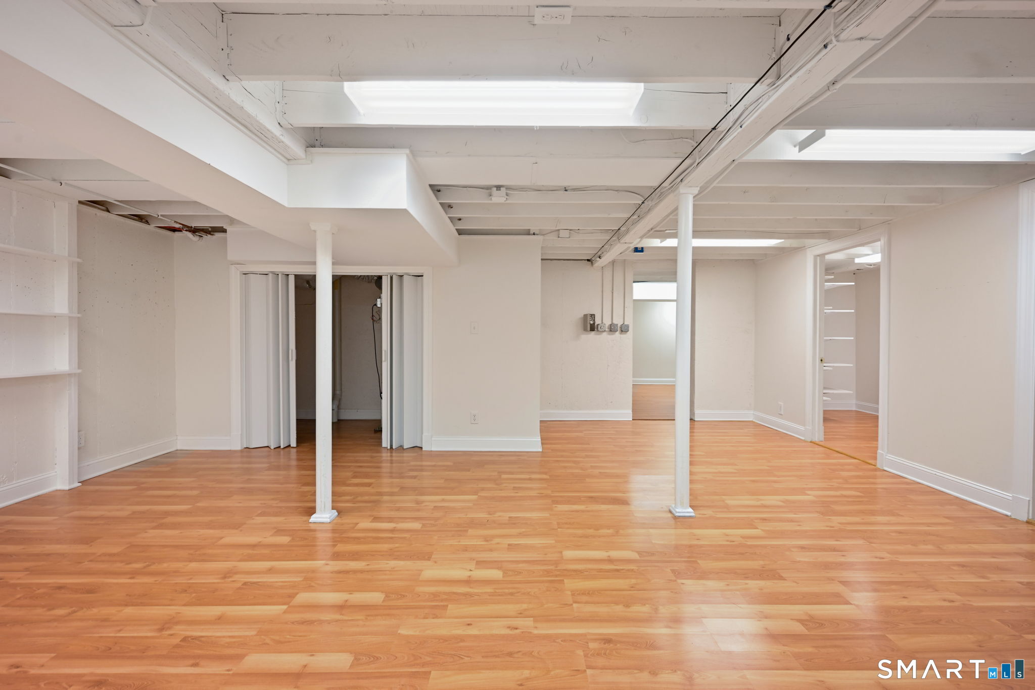 36 MacArthur Lane Stamford, CT 06902 - Photo 29 of 40 Partially finished lower level Play Room with great space!