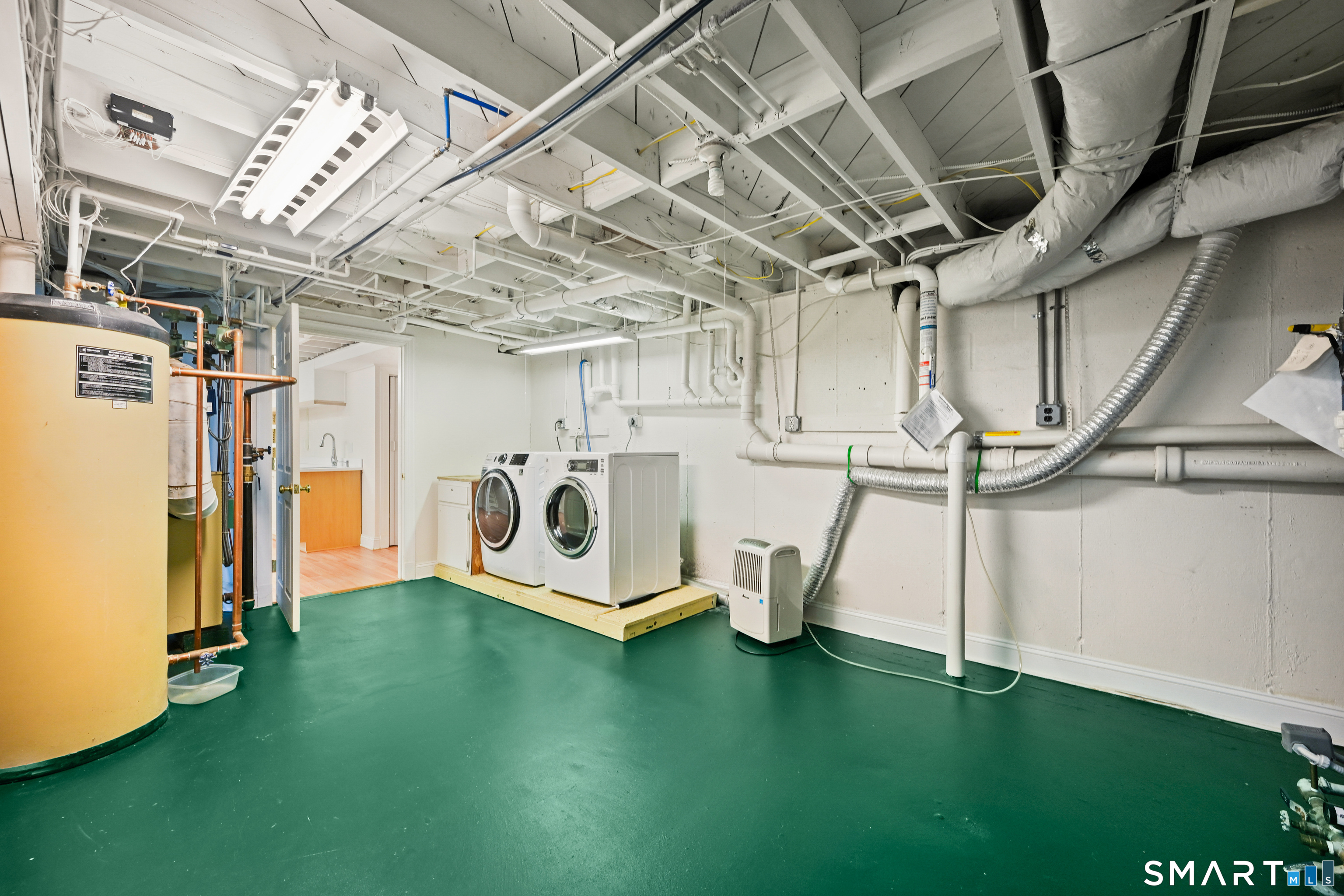 36 MacArthur Lane Stamford, CT 06902 - Photo 32 of 40 Large storage/mechanical room with Laundry