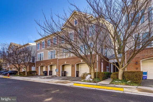 a view of a building with a yard