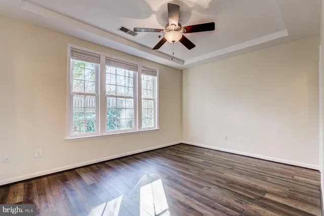 a view of a kitchen with a sink and dishwasher