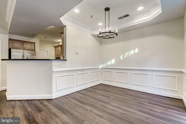 a bathroom with a sink toilet and a mirror