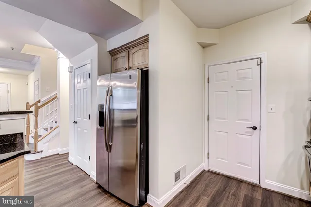 a bathroom with a sink a mirror and toilet