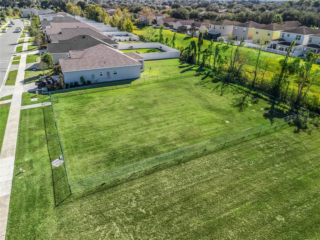 3 Northeast 125th Loop Oxford, FL 34484 - Photo 8 of 10 an aerial view of residential houses with outdoor space and trees