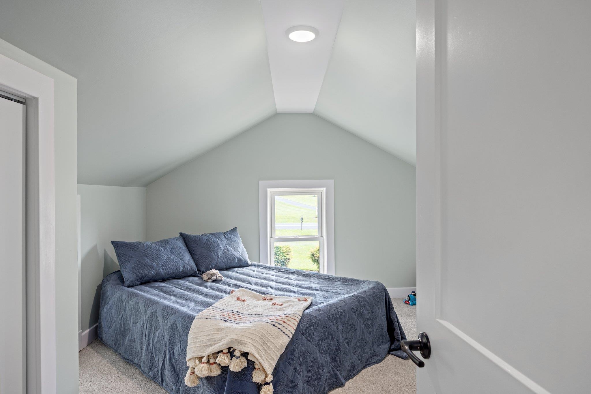 388 Kiddsville Road Fishersville, VA 22939 - Photo 30 of 50 a bedroom with a bed and a window