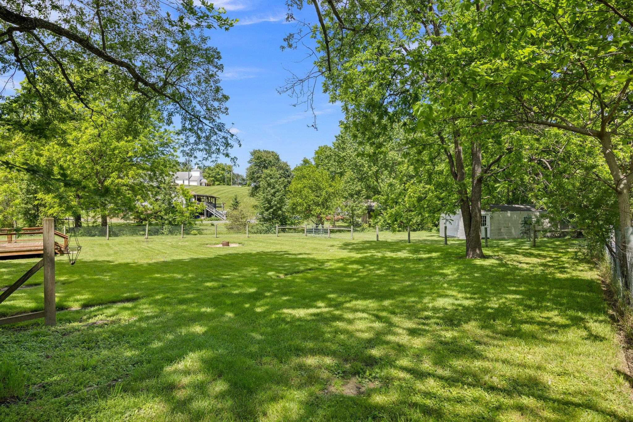 388 Kiddsville Road Fishersville, VA 22939 - Photo 49 of 50 a big yard with lots of green space and trees