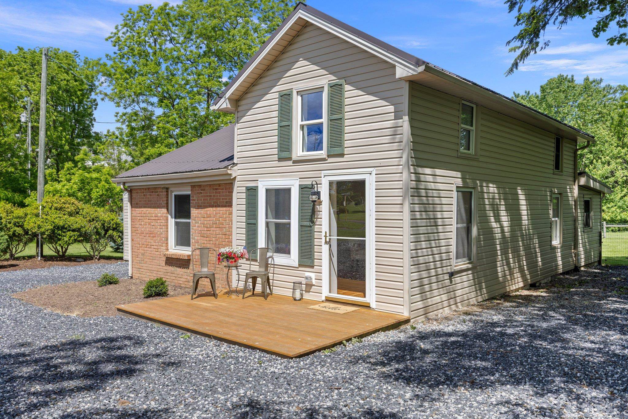 388 Kiddsville Road Fishersville, VA 22939 - Photo 8 of 50 a front view of a house with patio
