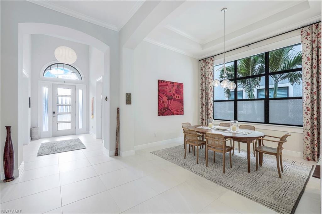 12762 Dundee Lane Naples, FL 34120 - Photo 14 of 35 a view of a livingroom with furniture and window