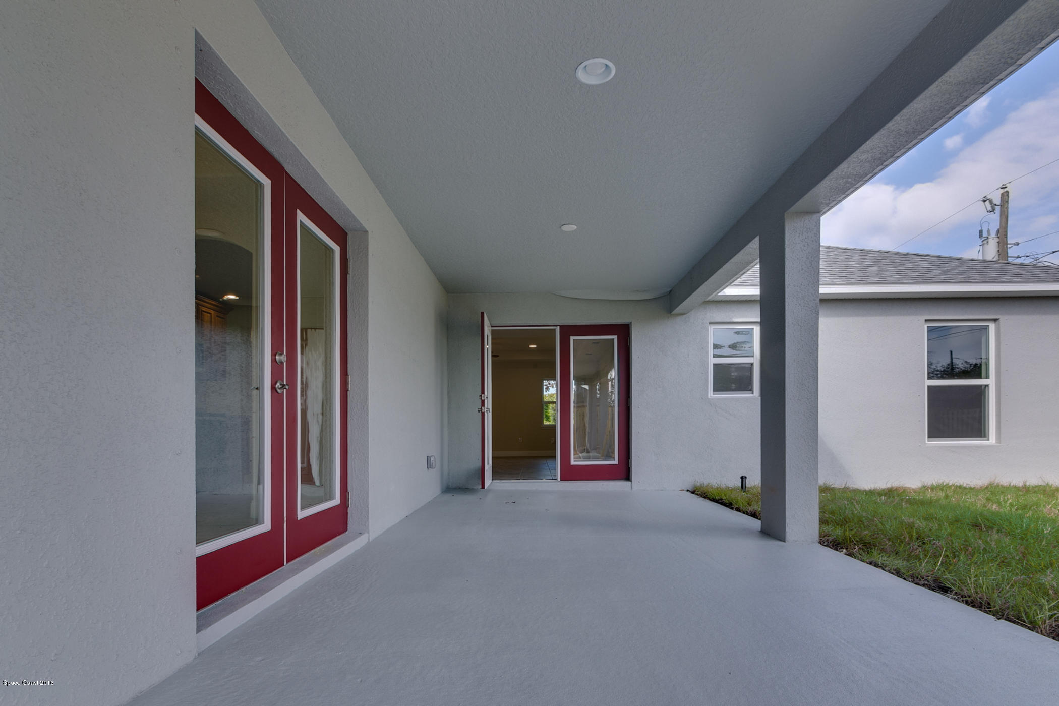 1111 Commerce Road Southeast Palm Bay, FL 32909 - Photo 11 of 12 HUGE Trussed Porch