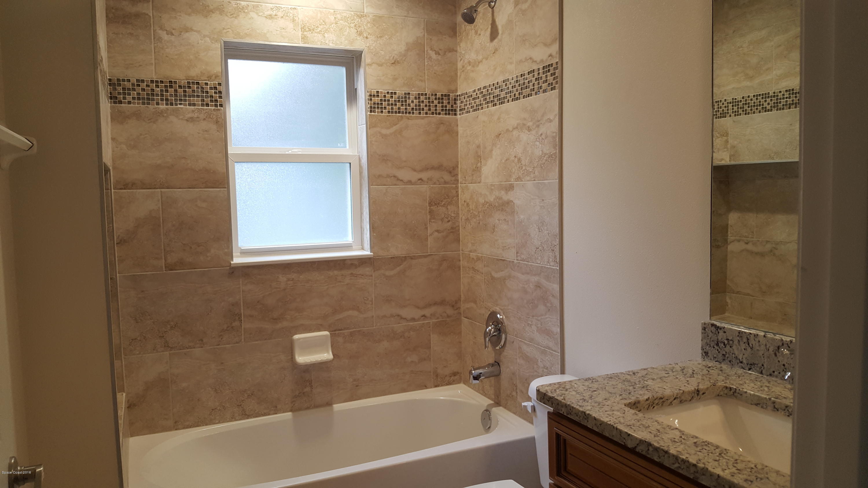 1111 Commerce Road Southeast Palm Bay, FL 32909 - Photo 8 of 12 Guest Bath