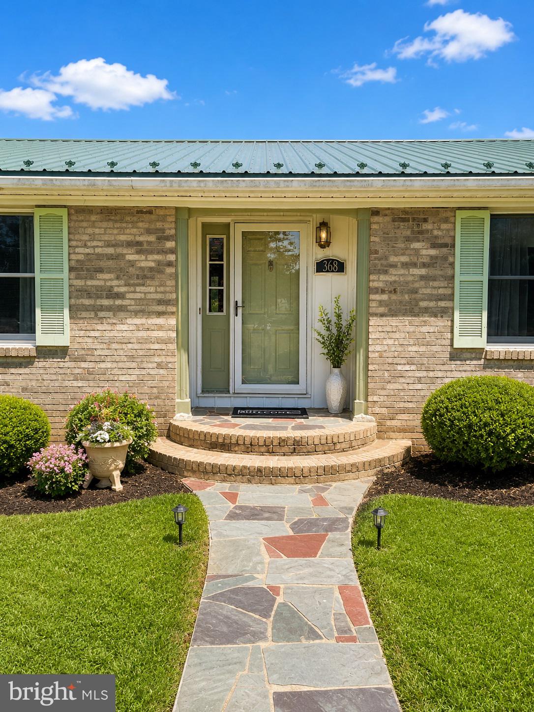368 Old Farm Road Luray, VA 22835 - Photo 2 of 30 Charming entrance with lush greenery.