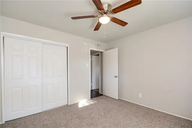 a view of porch with red door