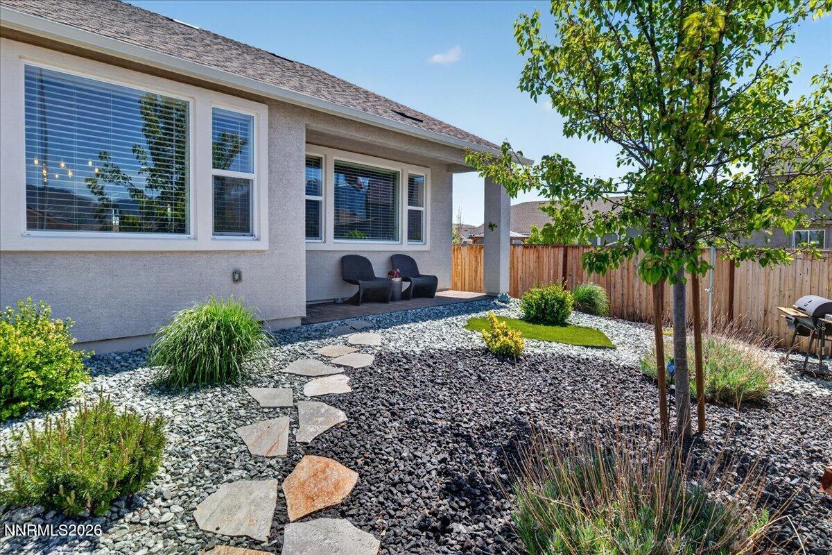 1640 Buttonwillow Street Minden, NV 89423 - Photo 33 of 39 a front view of a house with garden