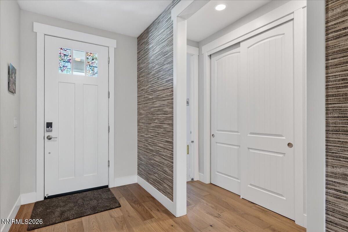 1640 Buttonwillow Street Minden, NV 89423 - Photo 5 of 39 a view of an entryway with wooden floor