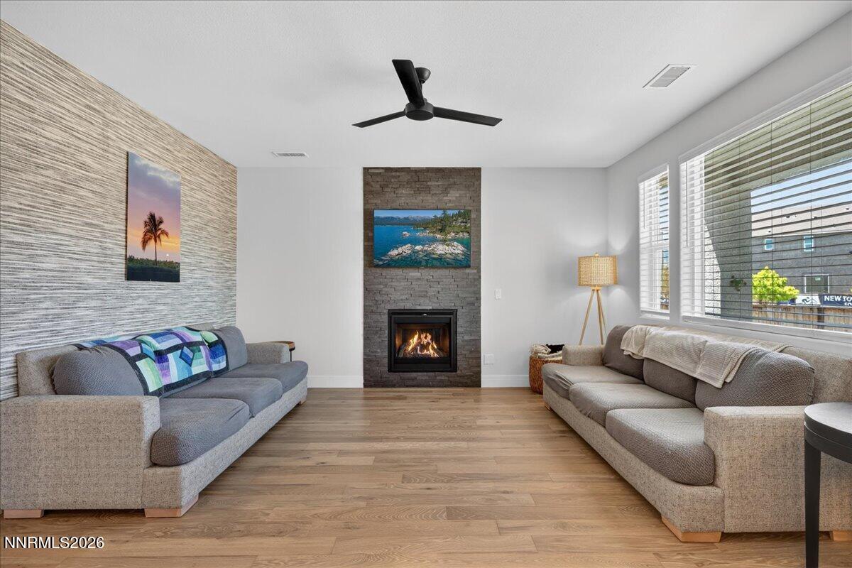 1640 Buttonwillow Street Minden, NV 89423 - Photo 7 of 39 a living room with furniture and a fireplace