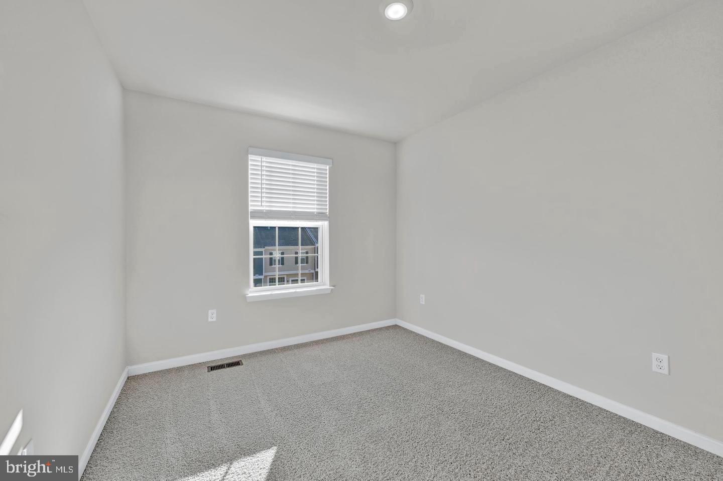 5030 Silver Oak Drive Rosedale, MD 21237 - Photo 3 of 3 a view of an empty room with a window