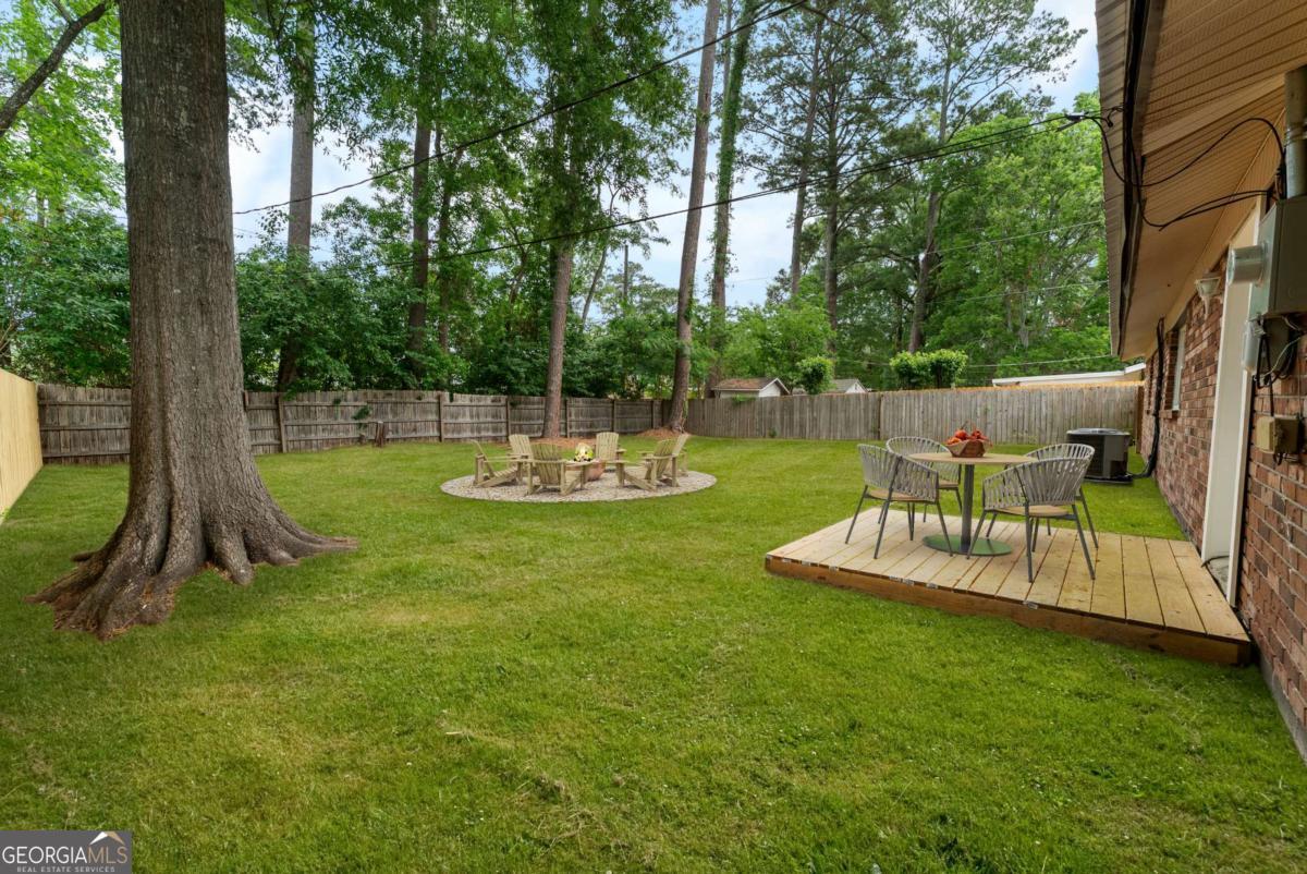 320 West Whatley Street Pooler, GA 31322 - Photo 28 of 34 a view of a chair and table in the garden