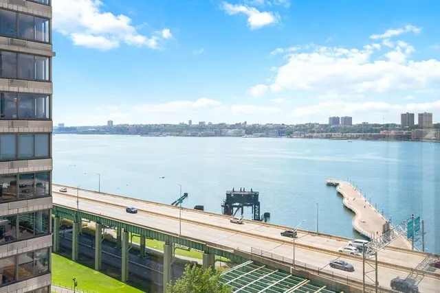 a view of a lake from a balcony