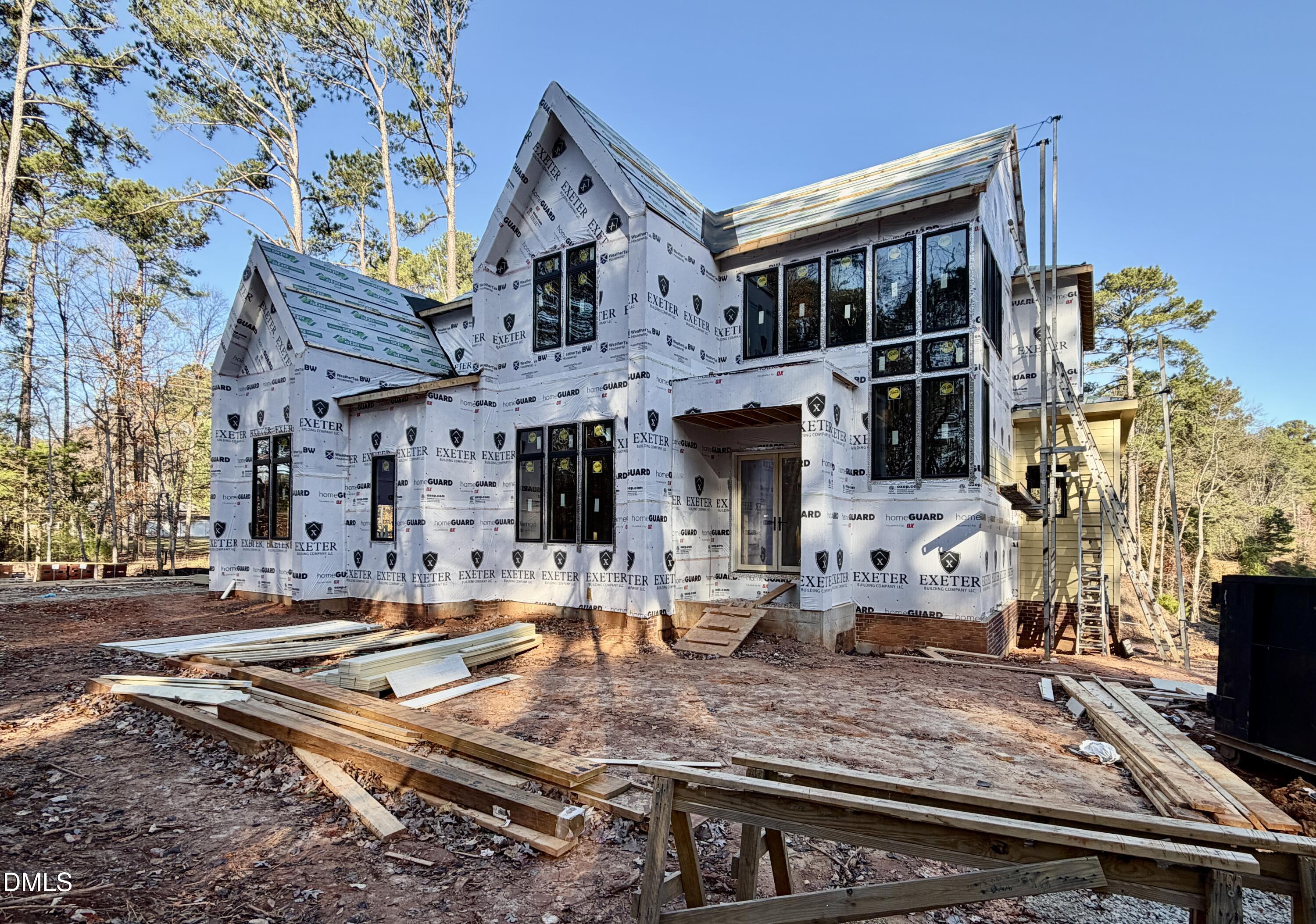 2332 Windy Woods Drive Raleigh, NC 27607 - Photo 3 of 9 a view of a house with a swimming pool