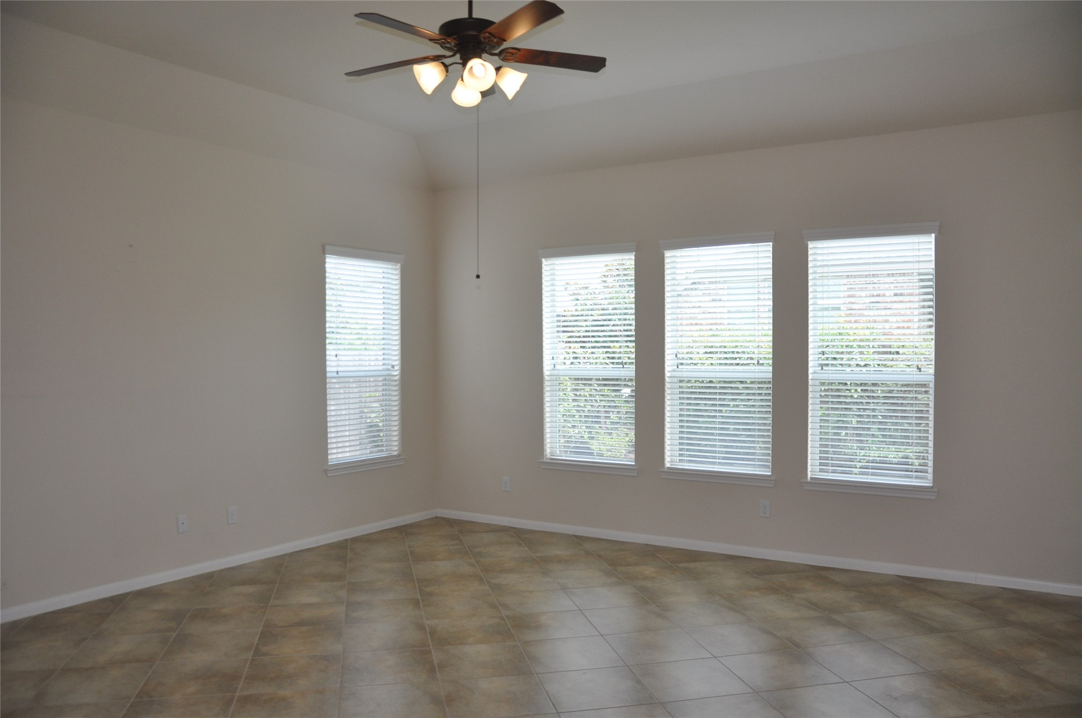 8161 Tranquil Lake Way Conroe, TX 77385 - Photo 16 of 20 a view of an empty room with a window