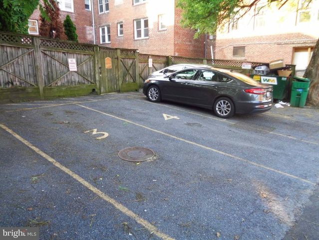 a car parked in front of a house