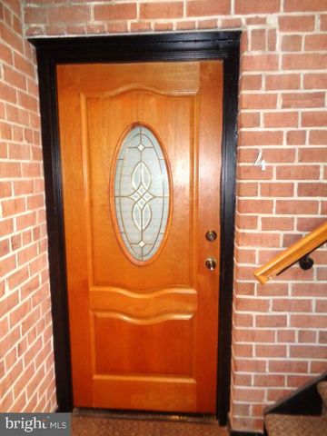 a view of door with wooden door