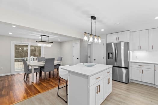 221 Plain Street Hanover, MA 02339 - Photo 13 of 29 a kitchen that has a lot of counter space and stainless steel appliances