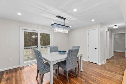 221 Plain Street Hanover, MA 02339 - Photo 14 of 29 a view of a dining room with furniture window and wooden floor