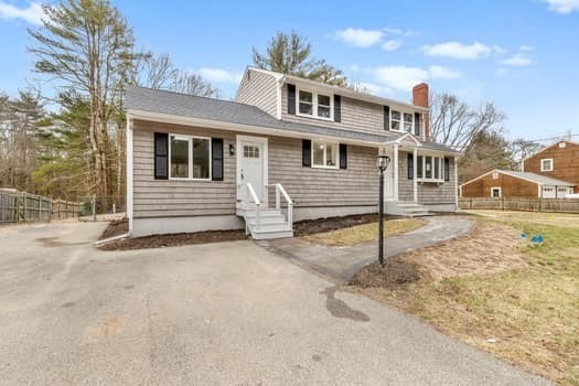 221 Plain Street Hanover, MA 02339 - Photo 2 of 29 a front view of a house with a road