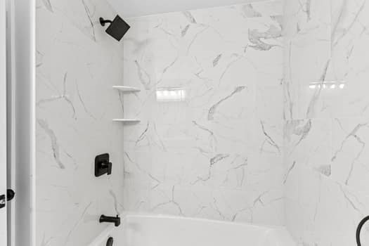 221 Plain Street Hanover, MA 02339 - Photo 23 of 29 a bathroom with a bathtub and shower