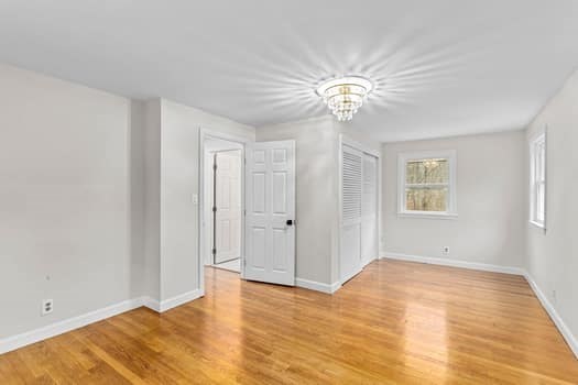 221 Plain Street Hanover, MA 02339 - Photo 25 of 29 a view of empty room with wooden floor