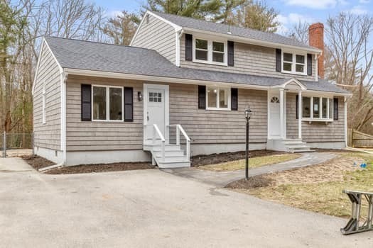 221 Plain Street Hanover, MA 02339 - Photo 3 of 29 a view of a house with small yard and wooden fence