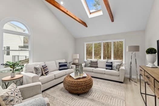 221 Plain Street Hanover, MA 02339 - Photo 7 of 29 a living room with furniture and a large window