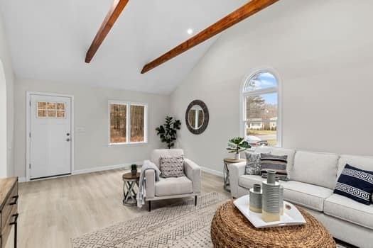 221 Plain Street Hanover, MA 02339 - Photo 8 of 29 a living room with furniture a rug and a window