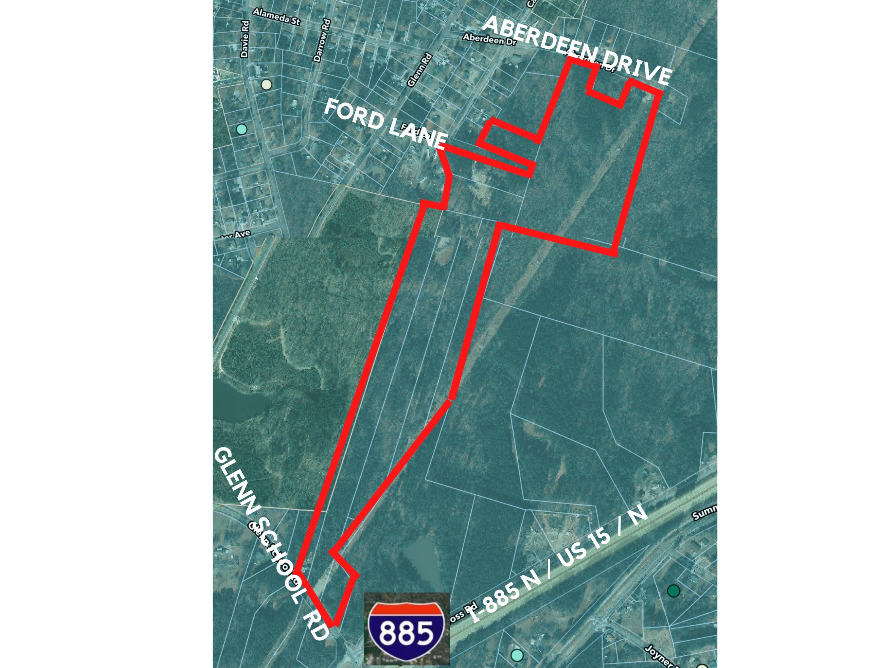 1720 Glenn School Road Durham, NC 27704 - Photo 2 of 10 a close up of a wall with a potted plant